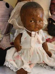 lot 98 image: Antique Black Americana Composite and Rag Doll Collection