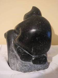 lot 194 image: Inuit Fine Art Soapstone Sculpture - Leatherwork