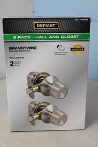 lot 174 image: NEW - Defiant Brandywine Stainless Steel HallCloset Door Knob (2-Pack) 050134004870 MSRP $18.00