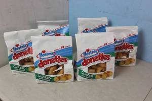 lot 265 image: 6 Bags of Hostess Glazed Mini Donuts Best By Date 3022023
