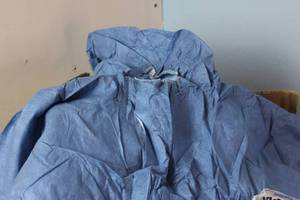 lot 437 image: Kimberly-Clark Kleenguard Chemical-Resistant Coveralls A60 45024 - Size XL - Blue Packaging shows weathering, coveralls appear fine