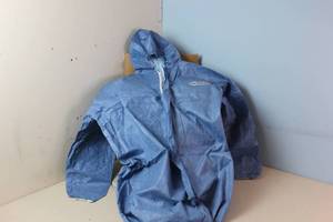 lot 428 image: Kimberly-Clark Kleenguard Chemical-Resistant Coveralls A60 45095 - Size 2XL - Blue Packaging shows weathering, coveralls appear fine
