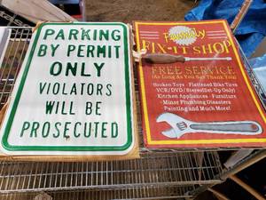Two Metal Signs