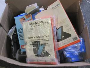 box of ipad mini cases , stapler, c...