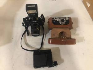 lot 23 image: Promaster 600 Ricoh Camera