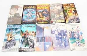 lot 11 image: (10) Vintage VHS Tapes Depicting the Life and Times of John Lennon, Def Leppard Etc.