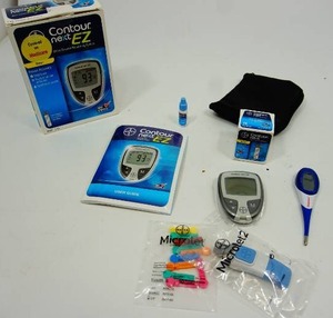 lot 44 image: Contour NEXT EZ Glucometer by Bayer