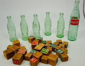 lot 129 image: Vintage Blocks and Coke Bottles