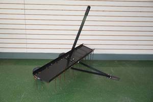 lot 3 image: Craftsman Tow Behind Dethatcher