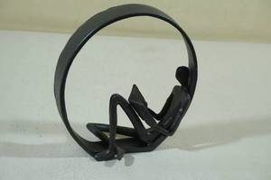 lot 37 image: Danya B. Contemporary Encircled Reader Cast Iron Sculpture Bookend Statue