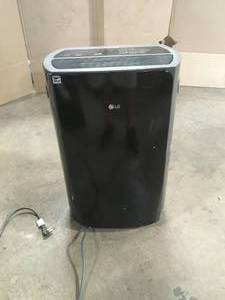 PuriCare 50-Pint Dehumidifier with Clear Bucket with Handle by LG Electronics Customer Returns See Pictures