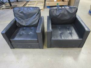 lot 358 image: 2 Kids Black Leather Chairs (SOME RIPS IN THE LEATHER, NEEDS A GOOD CLEANING)