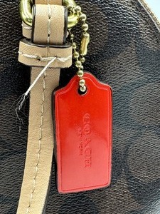 lot 89 image: Coach Signature Style Bag
