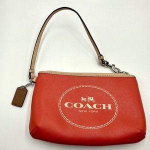 lot 91 image: Orange Coach Wristlet