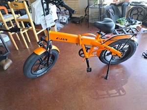 lot 98 image: E-Lux Sierra GT 48V 8-speed Foldable 20 Electric Bike Orange Frame (New in Box)