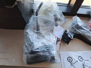 lot 19E image: GoCycle Accessories - Straps, Frame Protection, Charger