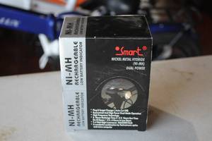 lot 382 image: Smart Nickel Metal Hydride Dual Power Battery Charger
