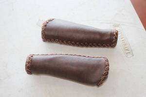 lot 461 image: Lot of (One Pair) Faux Leather Hand Grips - Left and Right