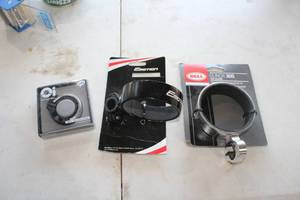 lot 477 image: Lot of (3) Bike Accessories (in original packaging) - Bell Cup Holder, Emotion Cup Holder, Oi Bicycle Bell