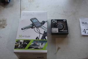 lot 478 image: Lot of (2) Bike Accessories (in original packaging) - Xventure XtremeCase XL, Oi Bicycle Bell