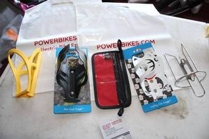 lot 494 image: Lot of (5) Bike Accessories - Smartphone Case, The Owl Cage Bottle Holder, Lucky Cat Cage Bottle Holder, Misc. Bottle Holders (x2)