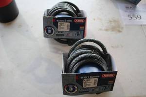 lot 558 image: Lot of (2) Abus Numero 5510C Combination Coiled Cable Bike Locks (in original packaging)