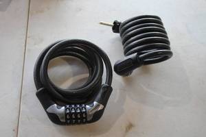 lot 561 image: Lot of (2) Combination Coiled Cable Bike Locks