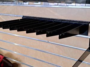 lot 1717 image: Lot of (9) 10 Slat Wall Shelf Brackets