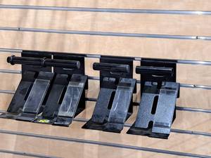 lot 1737 image: Lot of (4) Metal Slat Wall HatHelmet Hangers