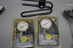 lot 843 image: Bike Accessories - Accu-Gage Professional Tire Gauges (x2), Seat Cushion Spring