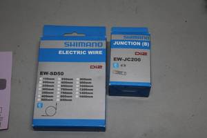 lot 1414 image: Lot of (2) Shimano Di2 Bike Accessories - Electric Wire, Junction (B)