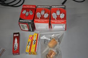 lot 1449 image: Microgard Premium Fuel Filters, ChampionNGK Spark Flugs, Loose Fuel Filters