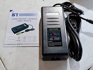 lot 130A image: ST 42V 2A Battery Charger KYLC084V42J