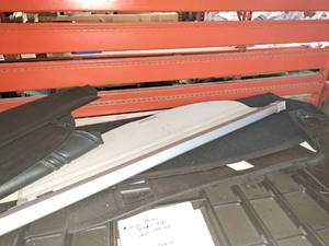 lot 1791 image: Nissan Rogue Toneau Cover and Cargo Carpet Mat
