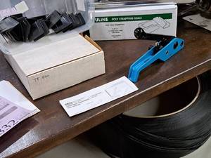 lot 1830 image: Uline Strapping Tensioner, Box Corner Protectors, Roll Strap