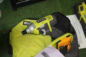 lot 1593 image: Ryobi 18V Drill with Tool Bag
