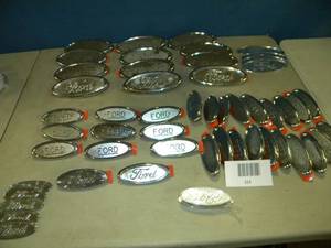 lot 114 image: Huge Assortment of Ford Emblem Plates