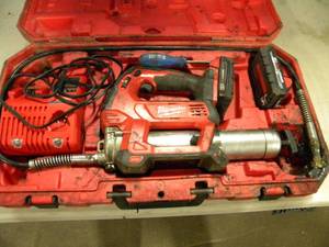 lot 135 image: Milwaukee 18V Grease Gun, Attachments and Case
