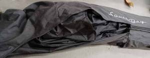 lot 29 image: South Bay Biminy Cover Canvas 104-inches X 111-inches with Boot (One side of Boot Zipper is broken, and a small tear in Boot)