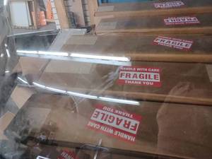 lot 36 image: Tracker Boat Windshield - Scratched
