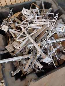 lot 68 image: Large Plastic Container Containing Disassembled Apparel Hangers for Slot Board and Grid Wall