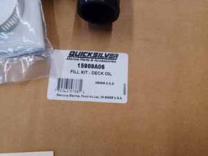 lot 106 image: Three New Quick Silver Deck Oil Fill Kits