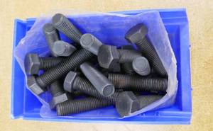 Box of 19 large black bolts, 10.95mm