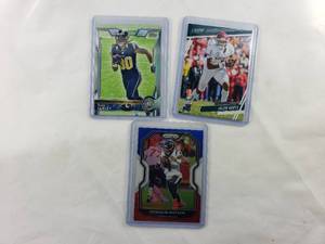 lot 84 image: Lot of 3 Todd Gurley Rookie Topps No. 499, Deshaun Watson Panini Prizm Rookie No. 74, Jalen Hurts Prestige 2020 Rookie No. 248