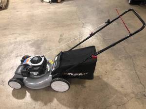 21 in. 140 cc Briggs and Stratton Walk Behind Gas Push Lawn Mower with Height Adjustment and with Mulch Bag by Murray Customer Returns See Pictures