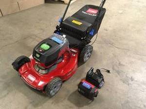 lot 19 image: Recycler 22 in. SmartStow 60-Volt Max Lithium-Ion Cordless Battery Walk Behind Mower, 6.0 Ah BatteryCharger Included by Toro  Customer Returns See Pictures