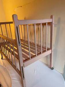 lot 168 image: Vintage Pink Wood Doll Crib
