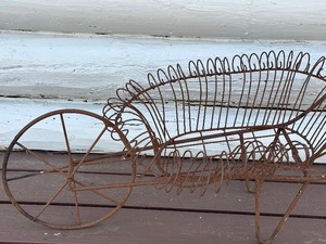 lot 15 image: Decorative Metal Wagon Shaped Planter