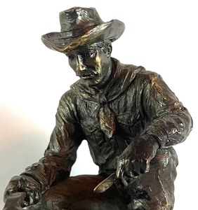 lot 189 image: Cowboy Themed Resin Figurine