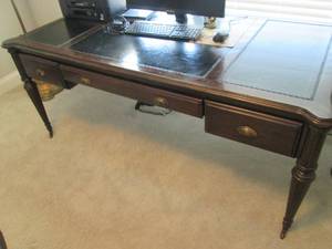 Ornate desk on wheels top measures ...